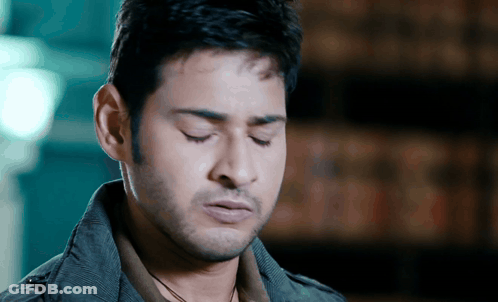 Man With Eyes Closed Wearing Jacket GIF