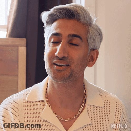 Man With Eyes Closed Wearing Netflix Logo GIF
