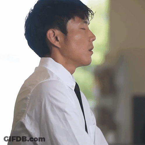 Man With Eyes Closed White Shirt Black Tie GIF