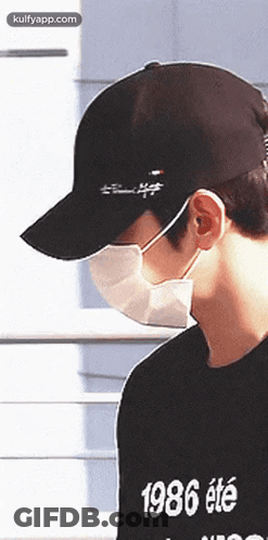 Man With Face Mask And Hat 1986 GIF