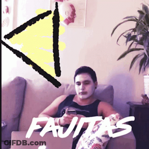 Man With Face Mask Sitting On Couch Saying Fajitas GIF