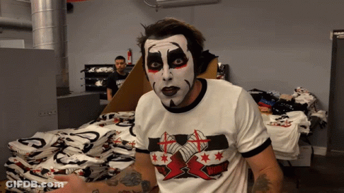 Man With Face Paint And Wrestling Shirt GIF