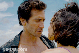 Man With Face Tattoo Looking At Woman GIF