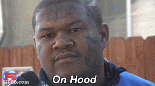 Man With Face Tattoo Saying On Hood At Microphone GIF