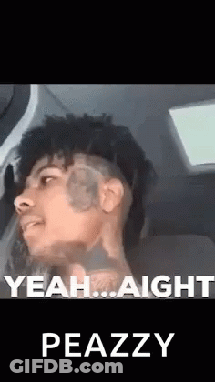 Man With Face Tattoo Sitting In Car Talking GIF