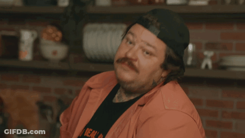 Man With Face Tattoo Wearing Hat GIF