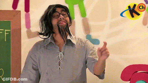 Man With Fake Beard And Glasses In Front Of Chalkboard With F GIF
