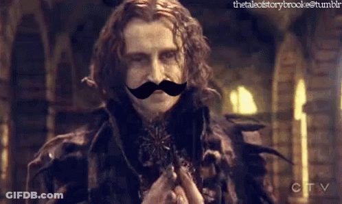 Man With Fake Mustache In Front Of CBS Logo GIF