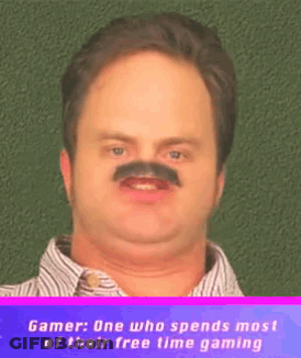 Man With Fake Mustache Saying Gamer One Who Spends Most Of Their Free Time Gaming GIF