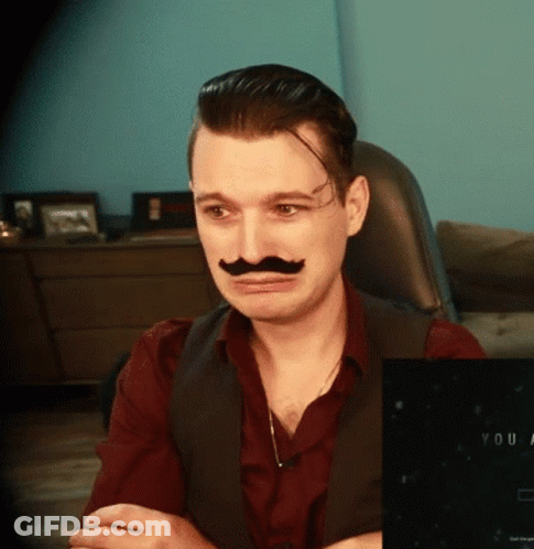 Man With Fake Mustache Sitting At Computer GIF