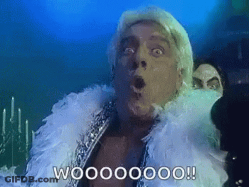 Man With Feather Boa Saying Wooooooo GIF