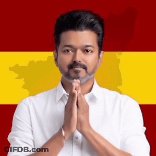 Man With Folded Hands In Front Of Map GIF