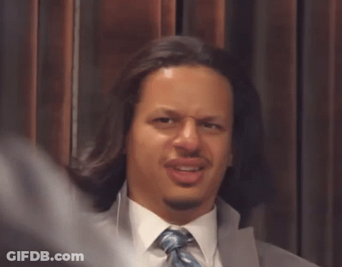 Man With Fork Funny Face At Man In White Suit GIF