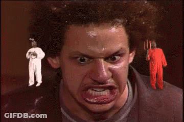 Man With Fork Funny Face At White-Suited Man GIF