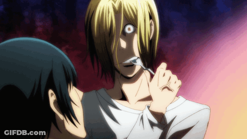 Man With Fork In Mouth Looking At Camera GIF
