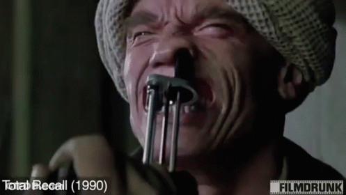 Man With Fork In Mouth Total Recall 1990 GIF