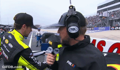 Man With Fox Radio Headset Talking To Another GIF