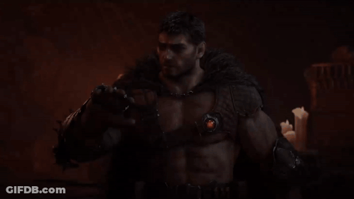 Man With Fur Collar And Red Light In Dark Room GIF