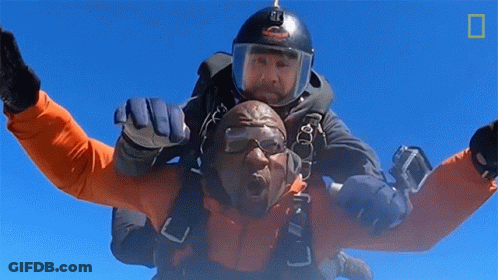 Man With G Helmet Jumping With Another Man GIF