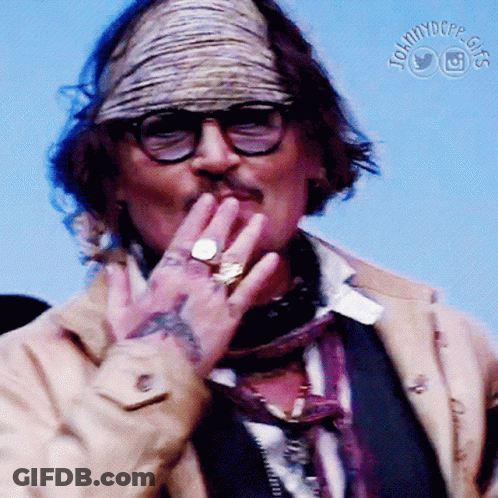 Man With Glasses And Bandana Covering Mouth Johnnydepp.com GIF