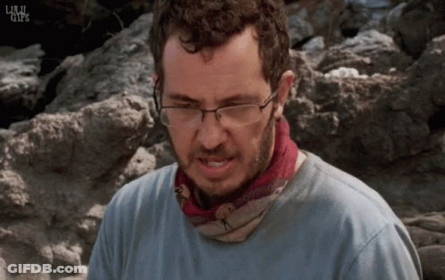 Man With Glasses And Bandana In Rocky Area Saying Life GIF