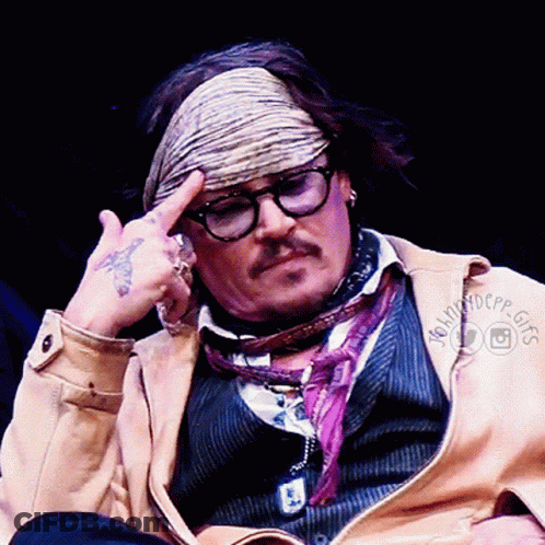 Man With Glasses And Bandana Saying Landscape GIF