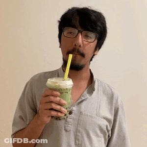 Man With Glasses And Beard Drinking Bubble Tea GIF