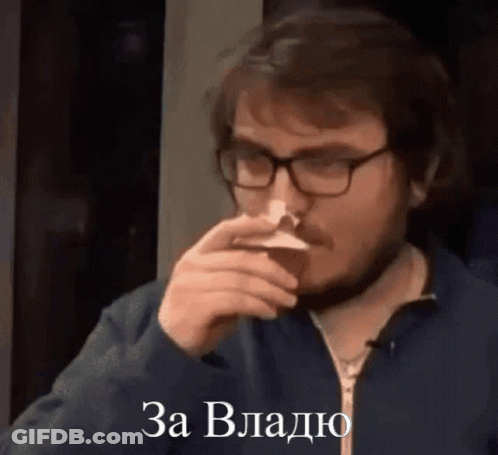 Man With Glasses And Beard Drinking From Cup Saying Za Vlado GIF