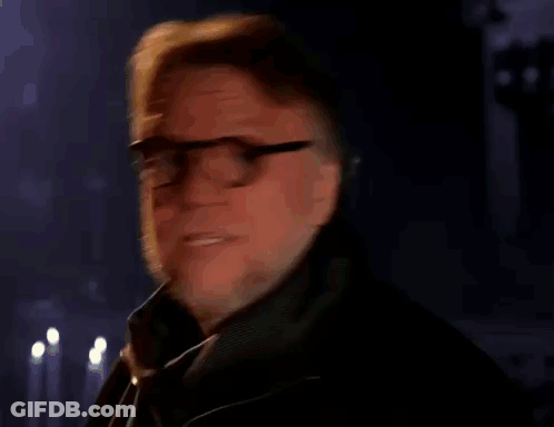 Man With Glasses And Beard Holding Nickelodeon Can GIF