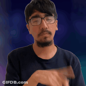 Man With Glasses And Beard Holding Wood GIF