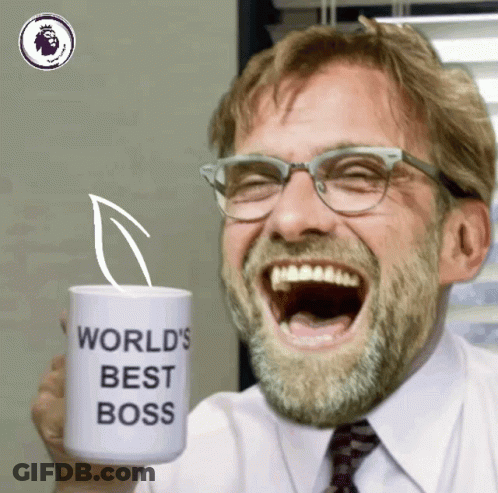 Man With Glasses And Beard Holding World's Best Boss Mug GIF