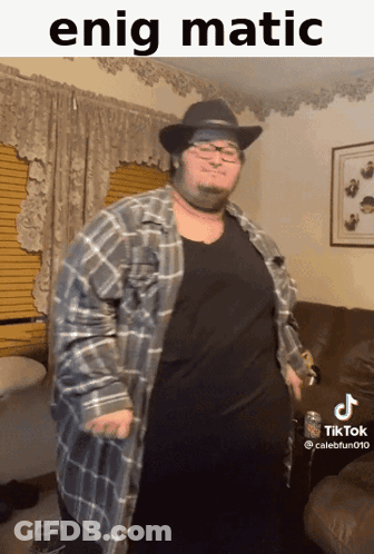 Man With Glasses And Beard In Black Shirt With Number 1 GIF
