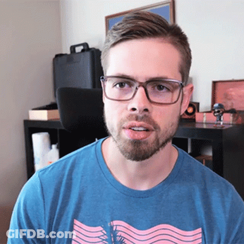 Man With Glasses And Beard In Blue Shirt GIF