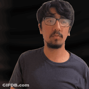 Man With Glasses And Beard In Blue Shirt GIF