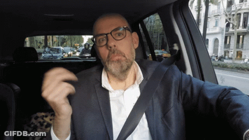 Man With Glasses And Beard In Car GIF
