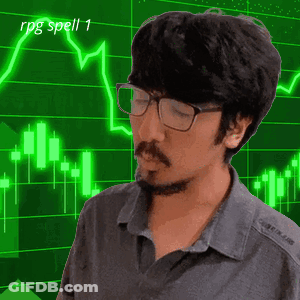 Man With Glasses And Beard In Front Of Green Graph Saying RPG Spell 1 GIF
