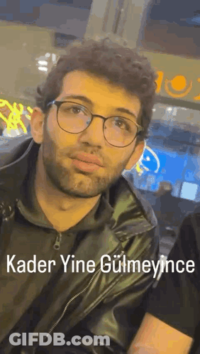 Man With Glasses And Beard In Leather Jacket GIF