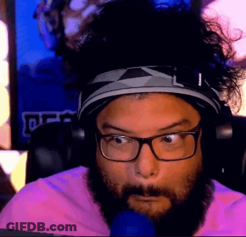 Man With Glasses And Beard In Pink Shirt GIF