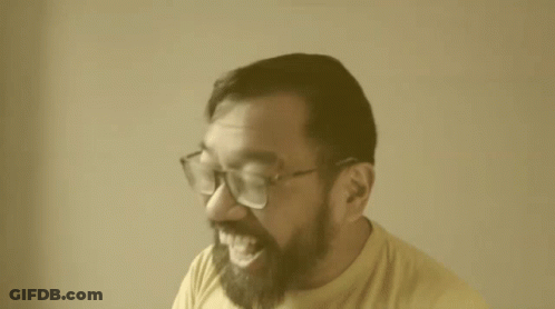 Man With Glasses And Beard Laughing GIF