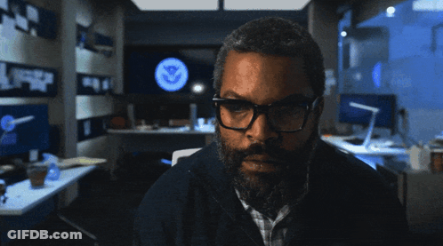 Man With Glasses And Beard Looking At Computer GIF