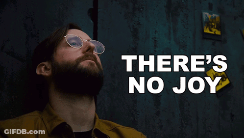 Man With Glasses And Beard Looking Up At There's No Joy GIF