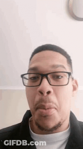 Man With Glasses And Beard Making A Face GIF