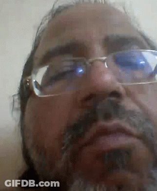 Man With Glasses And Beard Making Face GIF