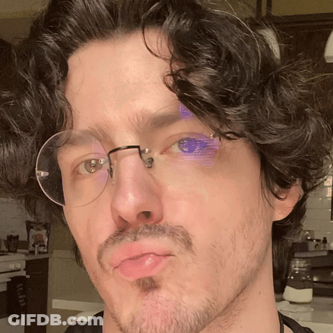 Man With Glasses And Beard Making Face GIF