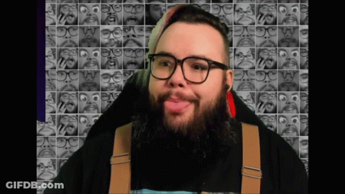 Man With Glasses And Beard Making Face GIF