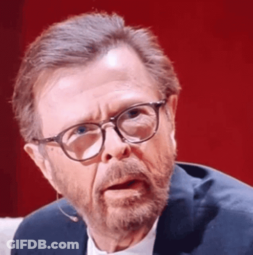 Man With Glasses And Beard Making Funny Face GIF