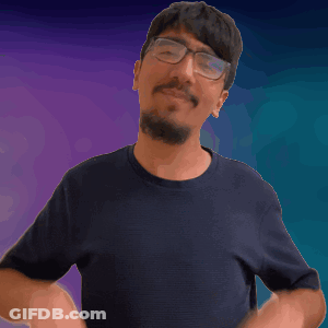Man With Glasses And Beard Making Funny Face GIF