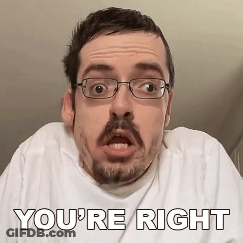 Man With Glasses And Beard Making Funny Face GIF