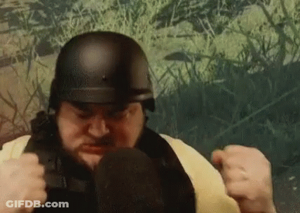 Man With Glasses And Beard Making Funny Face Saying Vagina GIF