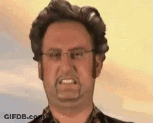 Man With Glasses And Beard Making Funny Face GIF
